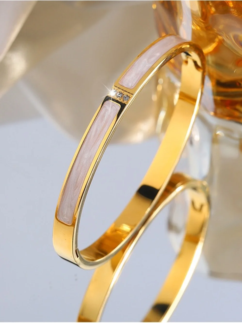 Stainless Steel Gold Bangle Bracelet with White Inlay and Crystal Accents